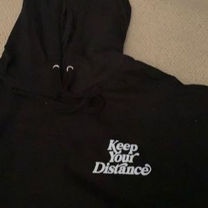 Black hoodie with unique writing